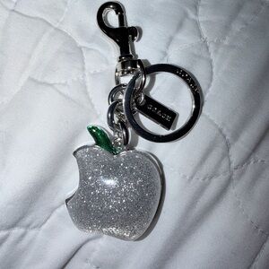Coach Silver Apple Keychain with Green Leaf